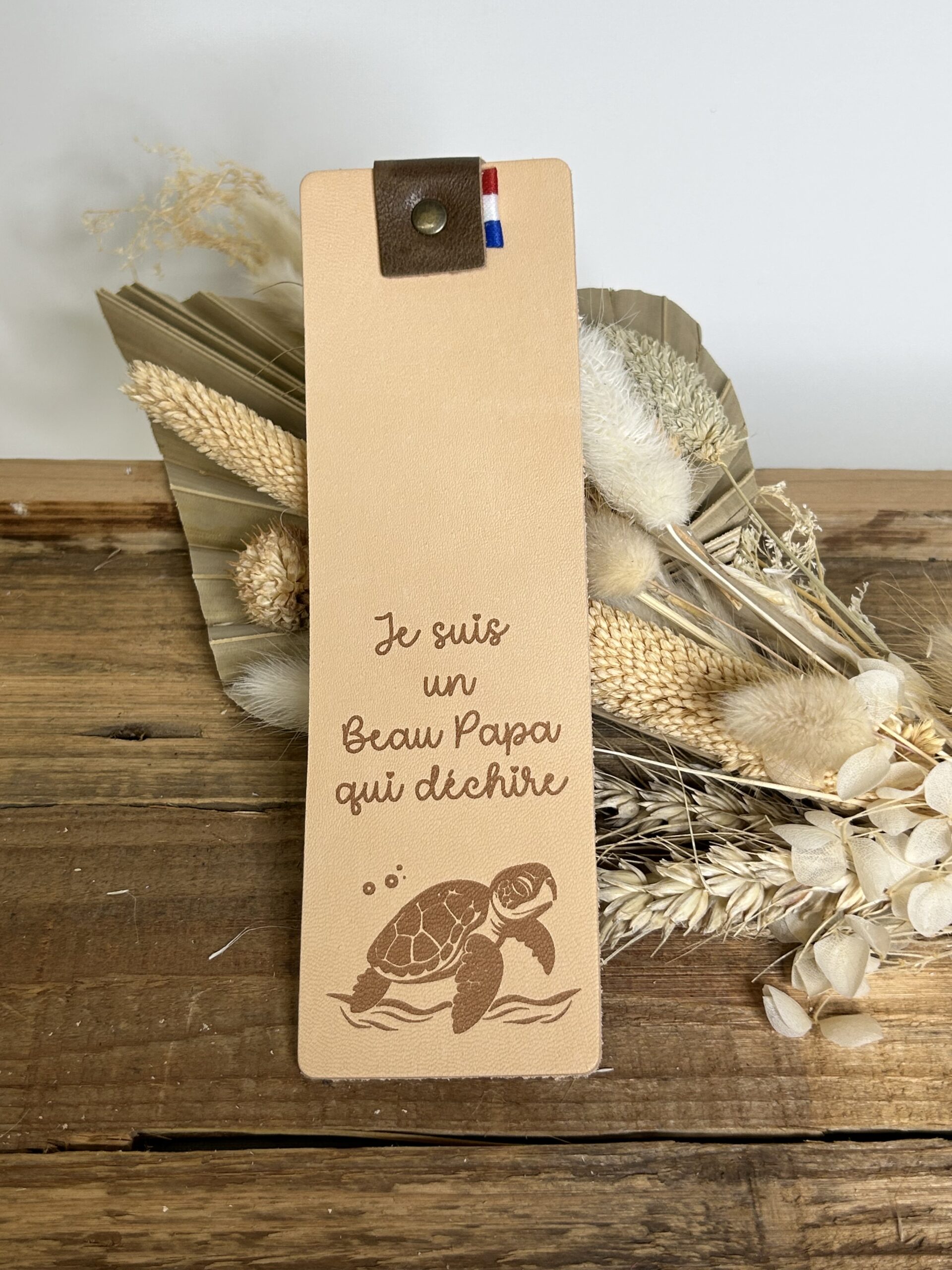 Marque-page en cuir "Je suis un beau papa qui déchire"