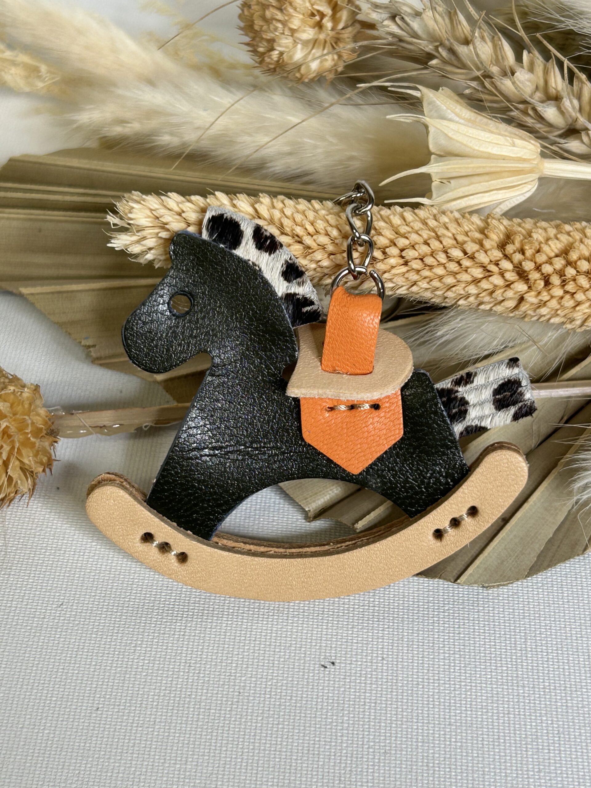 Bijoux de sac cheval à bascule en cuir